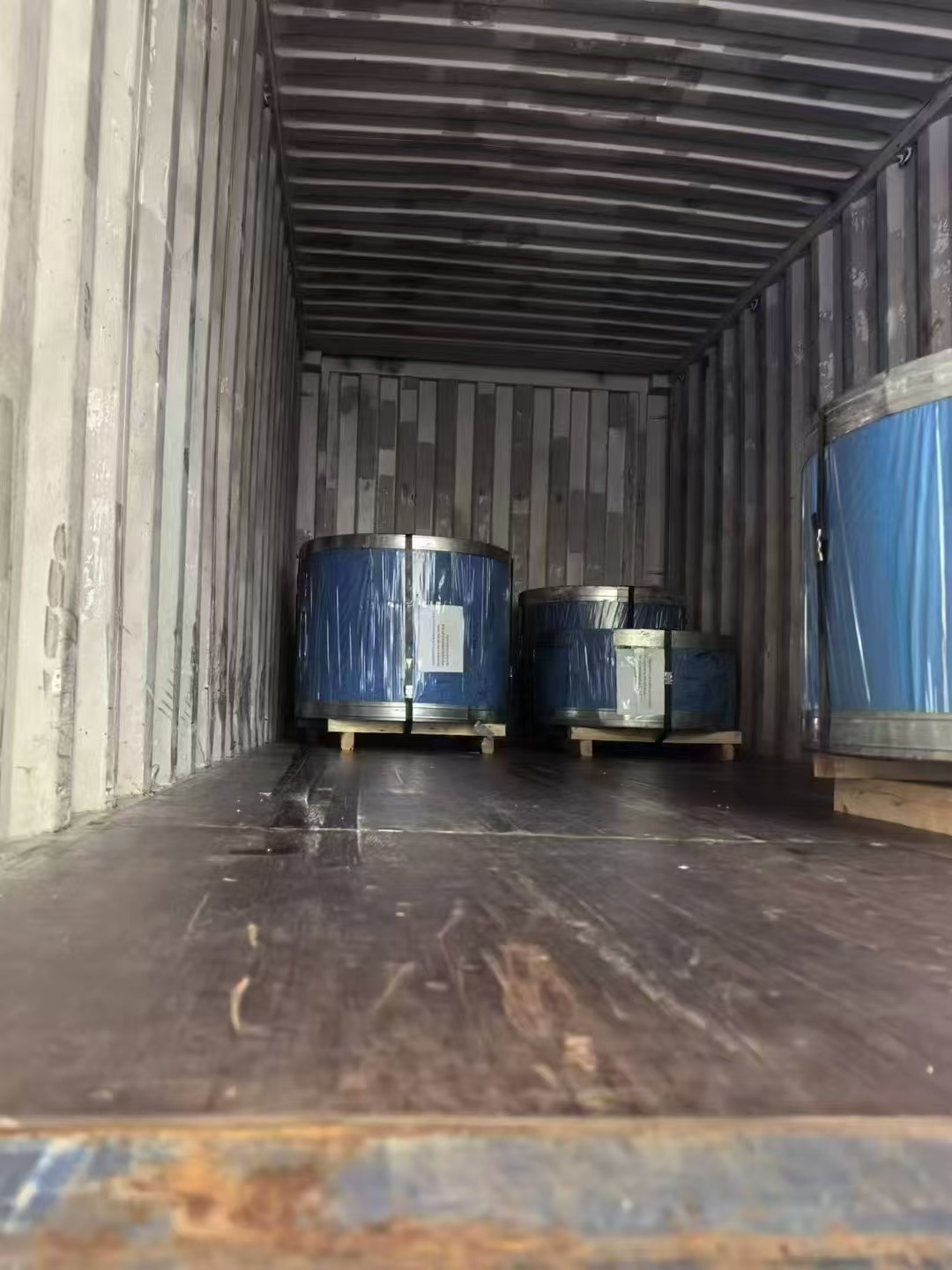 Protected stainless steel coils loaded in a shipping container